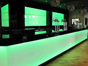 Illuminated green splashback